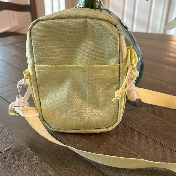 NWOT, Adidas crossbody phone/ utility pouch in neon yellow . - Picture 3 of 5